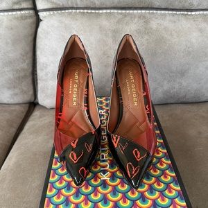 Pointed toe high heel 3.74” leather with heart accents. Only worn once